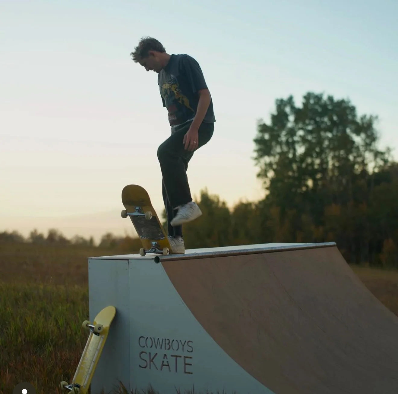 Mid-build: framed transitions standing in the yard, Skatelite top sheet still rolled